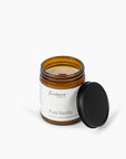 Amber jar candle with black lid beside it, Pure Vanilla label, Fontana Candle Co.