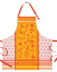 Orange fruit jacquard apron with red straps; white side sections with small fruit prints.