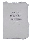 Gray faith-themed Christmas card with centered holiday message in dark printed text