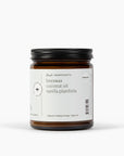 Amber candle jar with back label and black ridged lid, Fontana Candle Co.