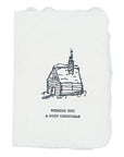 Christmas card with ink drawing of a house and “Wishing you a cozy christmas” text