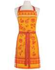 Orange fruit jacquard apron with red borders, fruit print, and tied waist detail.