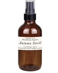 Amber glass room spray bottle with white-ink label and silver mist pump