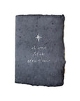 Dark navy faith-themed Christmas card with small star and handwritten message