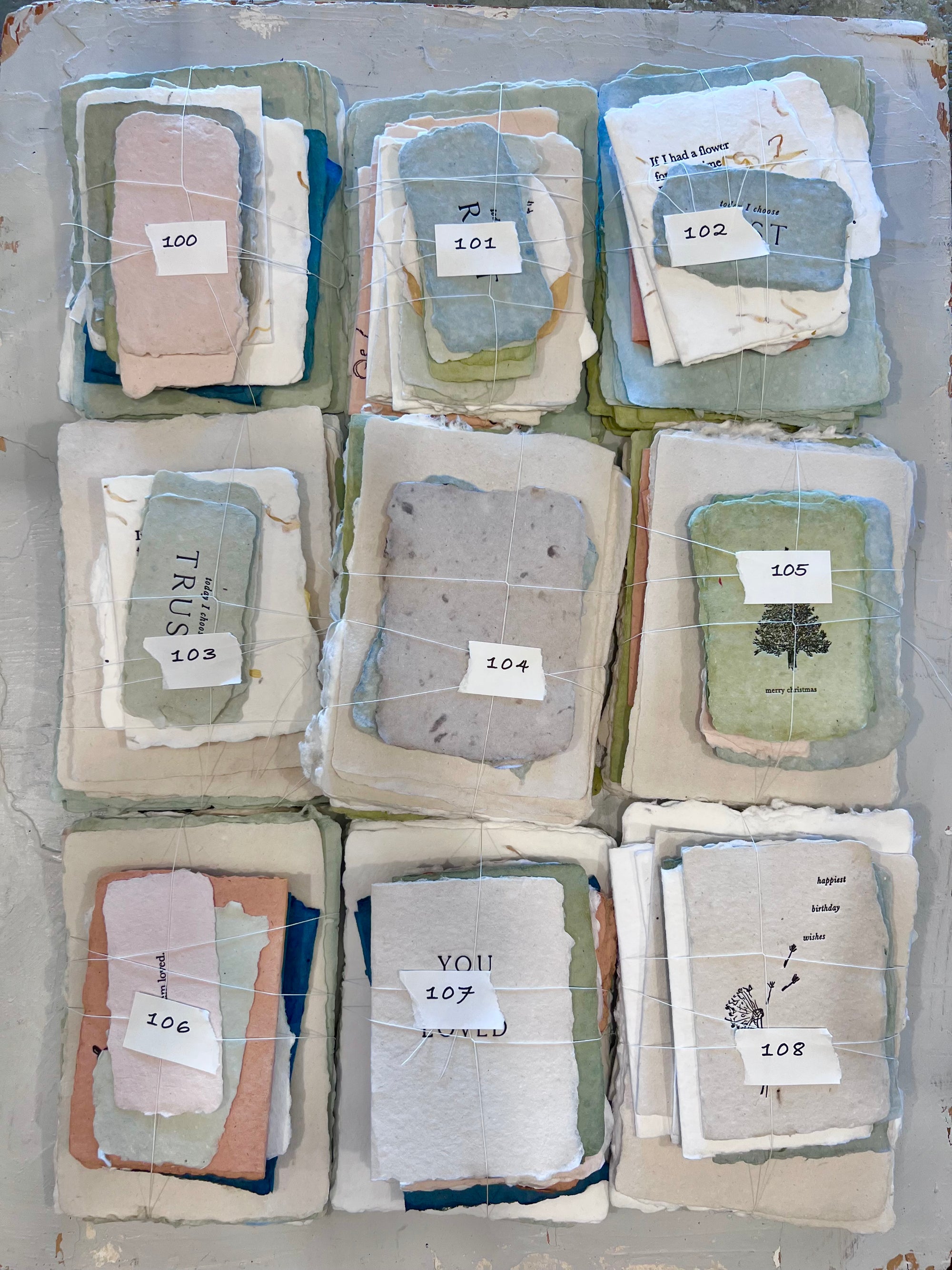 Assorted fabric bundle set with labeled packs 100–108