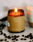 Spiced Latte beeswax jar candle with black lid lit flame and coffee bean decoration