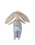 Rabbit plush doll with brown ears and blue striped overalls, back view