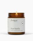 Amber jar candle with lit wick, Pure Vanilla label on jar, Fontana Candle Co.