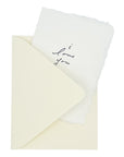 White love you greeting card with cursive message, inside a matching envelope
