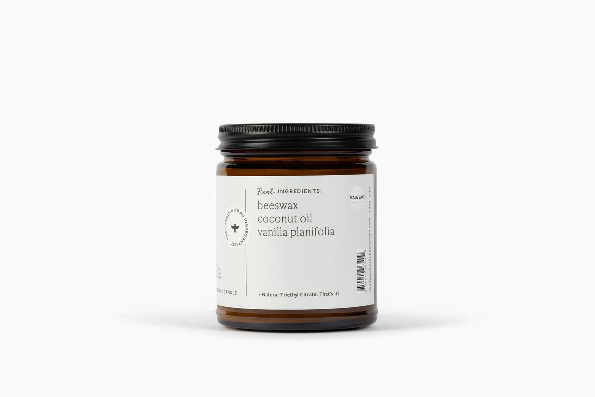 Amber candle jar with back label and black ridged lid, Fontana Candle Co.