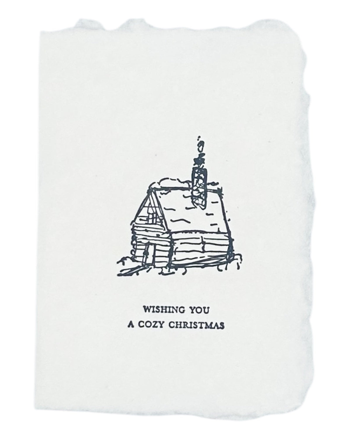 Christmas card with ink drawing of a house and “Wishing you a cozy christmas” text