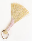 Tampico fiber wing with brown leather cord handle, pink striped base and tan fibers