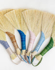 Set of hand brooms with straw-yellow bristles, mixed handles, leather cord loops