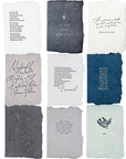 Faith-themed Christmas card set with nine textured cards in white, navy, and gray tones