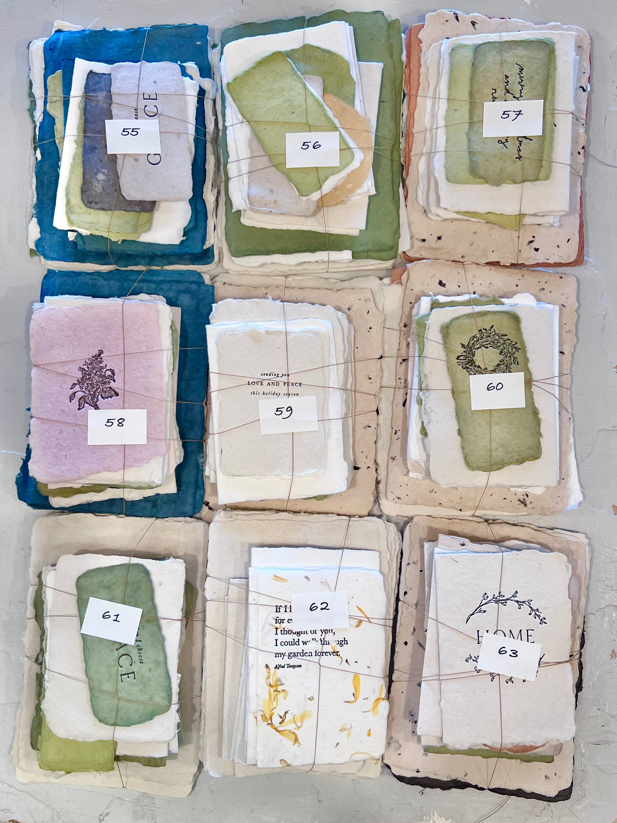Assorted fabric scrap bundles with numbered tags for 55–63